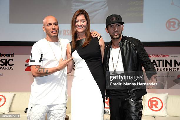 Alexis y Fido and Jennifer Warren attend Billboard Latin conference 2014 at JW Marriott Marquis on April 23, 2014 in Miami, Florida.