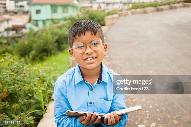 education. children. little boy living in india ready for school. - kids reading glasses stock pictures, royalty-free photos & images