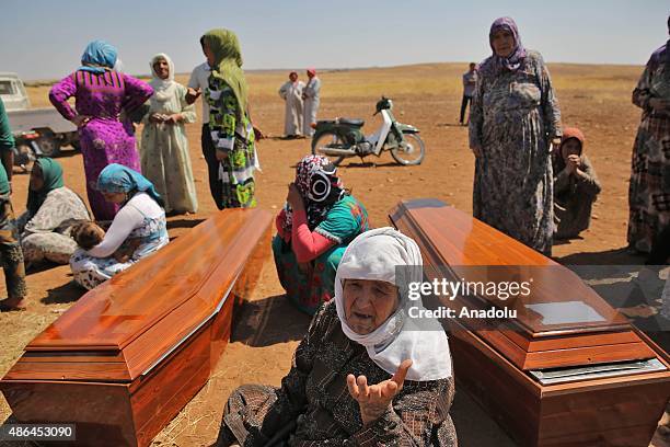 Relatives mourn during funeral of Syrian children Aylan his brother Galip and their mother Zahin Kurdi who drowned after their boat sank en route to...