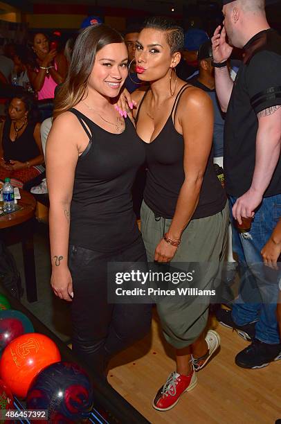 Sarah Vivan and Laura Govan attend The Grass Is Greener at Bowlmor lanes on September 3, 2015 in Atlanta, Georgia.