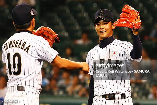 Starting pitcher Shotaro Ueno celebrates after winning the game between Australia and Japan in the super round game between Japan v South Korea...