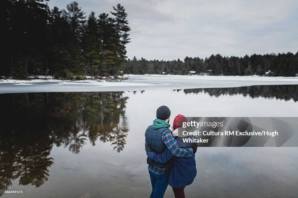 Couple by lake, Catchacoma, Ontario, Canada