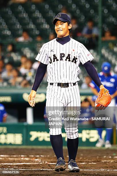 Starting pitcher Shotaro Ueno celebrates after winning the game between Australia and Japan in the super round game between Japan v South Korea...