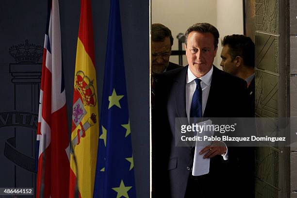 British Prime Minister David Cameron and Spanish Prime Minister Mariano Rajoy arrive to a press conference at Moncloa Palace on September 4, 2015 in...