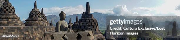 panoramic image, the buddhist temple of borobudur, java, indonesia - borobudur temple stock pictures, royalty-free photos & images