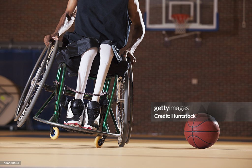 Man who had Spinal Meningitis in wheelchair playing basketball