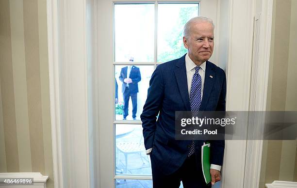 Vice President Joe Biden attends a bilateral meeting in the Oval Office between President Barack Obama and King Salman bin Abd alAziz of Saudi Arabia...