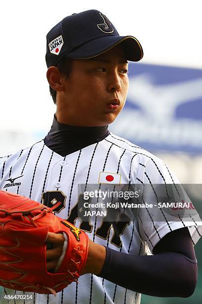 Starting pitcher Shotaro Ueno looks on the game between Australia and Japan in the super round game between Japan v South Korea during the 2015 WBSC...