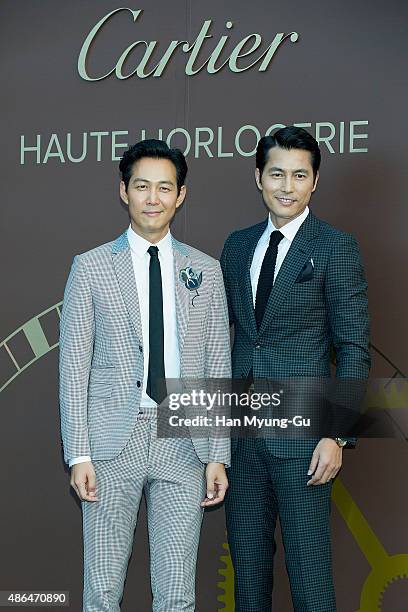 South Korean actors Lee Jung-Jae and Jung Woo-Sung attend the photo call for 2015 Cartier Fine Watchmaking Collection Event at Shilla Hotel on...