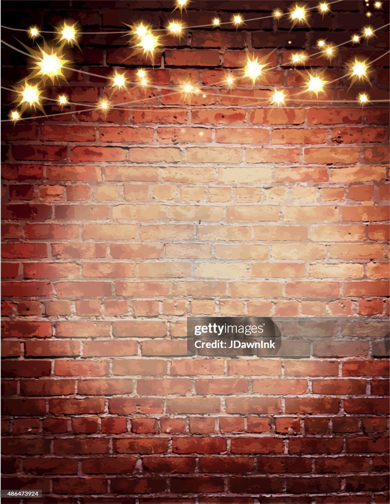 Rustic old fashioned brick wall with elegant string lights background