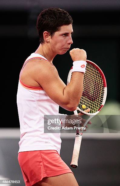 Carla Suarez Navarro of Spain celebrates match point after her match against Angelique Kerber of Germany on day four of the Porsche Tennis Grand Prix...