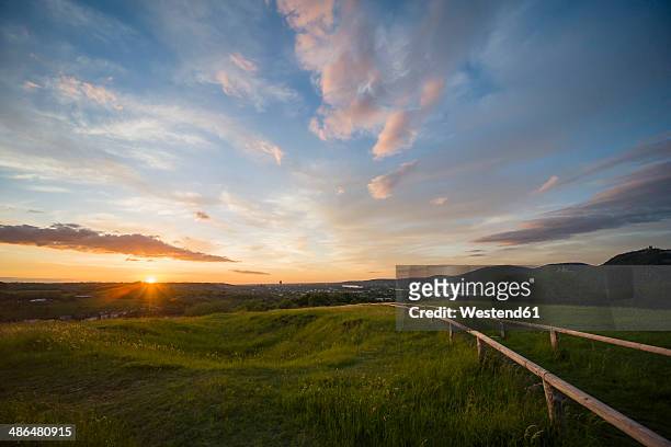 germany, north rhine-westphalia, view from rodderberg to bonn at sunset - north rhine westphalia stock pictures, royalty-free photos & images