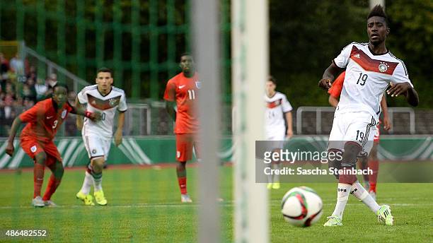 Prince-Osei Owusu of Germany scores his team's first goal by a penalty during the U19 international friendly match between Germany and England on...