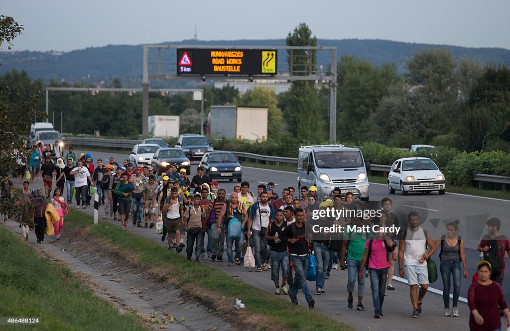 Migrants March Towards Austria