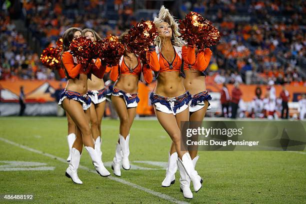 The Denver Broncos Cheerleaders perform during a break in the action against the Arizona Cardinals during preseason action at Sports Authority Field...