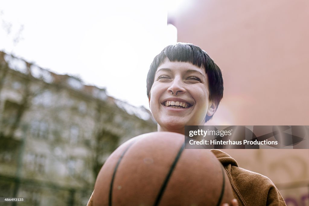 Young Woman With Basketball