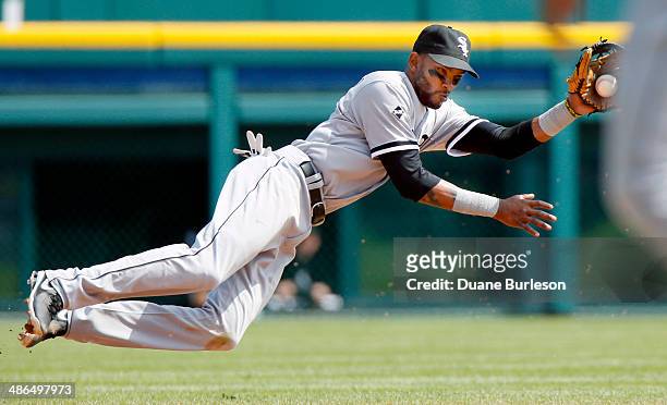 Shortstop Alexei Ramirez of the Chicago White Sox makes a diving stop on a grounder hit by Ian Kinsler of the Detroit Tigers and throws him out at...