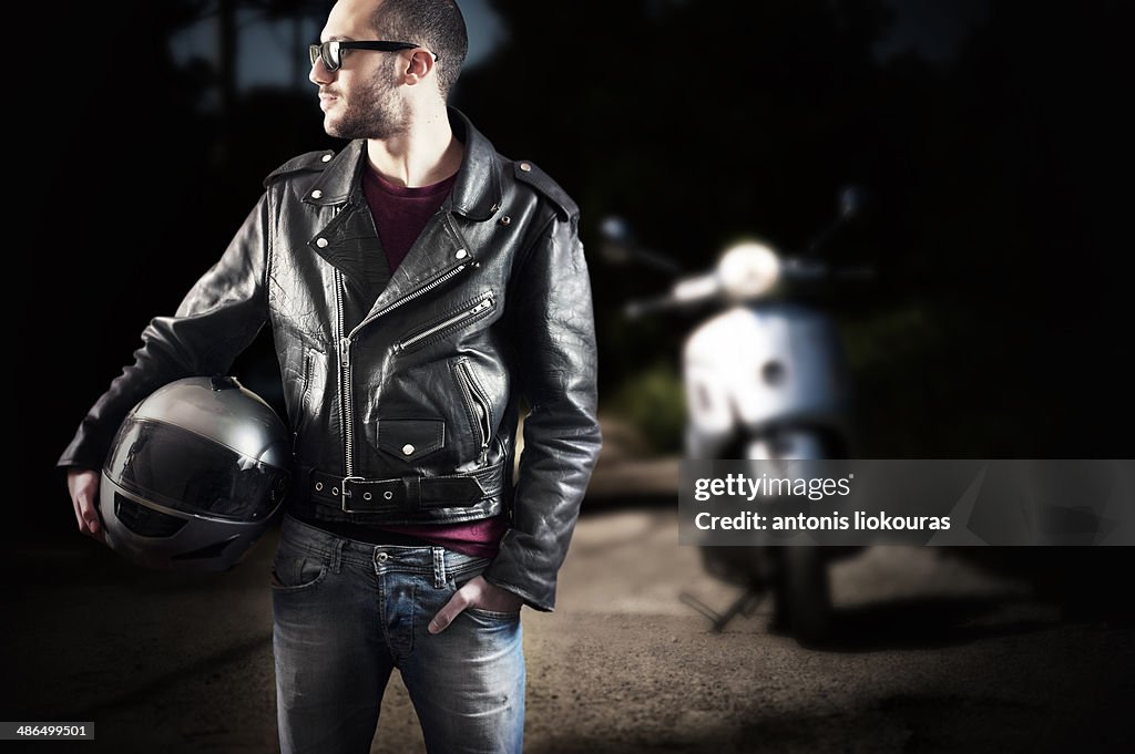 Biker in leather jacket and sunglasses