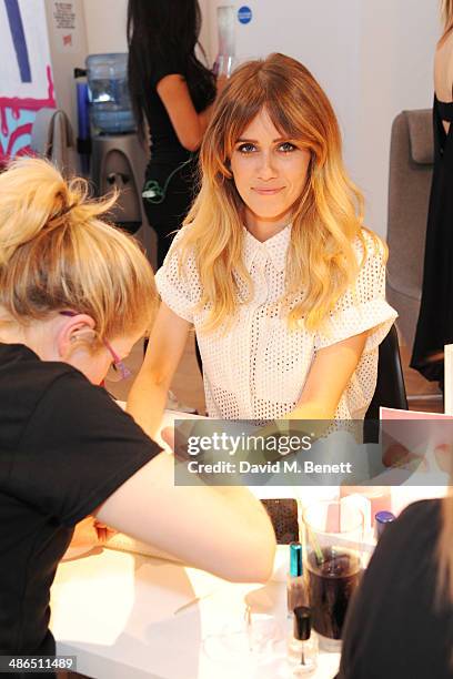 Jade Williams aka Sunday Girl enjoys a manicure at the Beats by Dr. Dre Drenched in Colour nail event on April 24, 2014 in London, England.