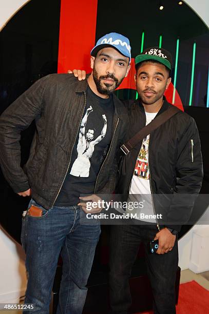 Alex Lanipekun and Anthony Welsh attend the Beats by Dr. Dre Drenched in Colour nail event on April 24, 2014 in London, England.