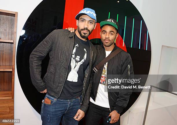 Alex Lanipekun and Anthony Welsh attend the Beats by Dr. Dre Drenched in Colour nail event on April 24, 2014 in London, England.