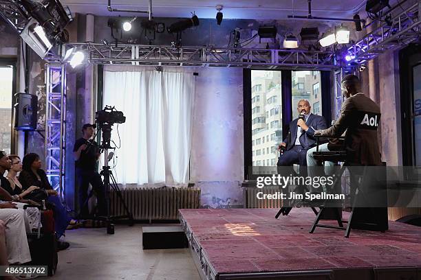 Personality/comedian Steve Harvey and TV personality Kevin Thompson attend the AOL BUILD Speaker Series: Steve Harvey at AOL Studios In New York on...