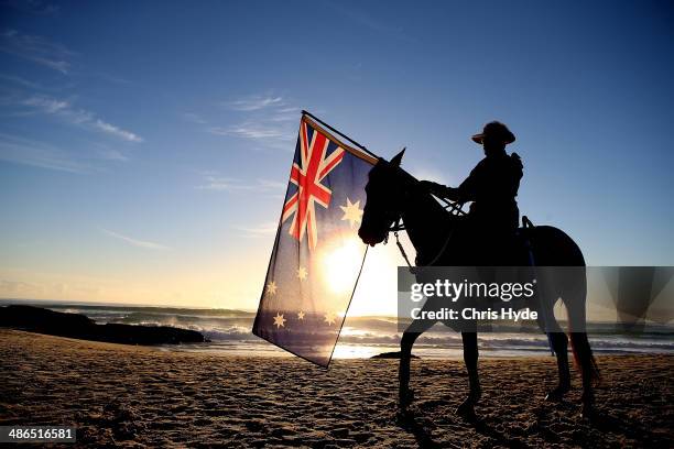 Member of the Mudgeeraba light horse troop takes part in the ANZAC dawn service at Currumbin Surf Life Saving Club on April 25, 2014 in Gold Coast,...