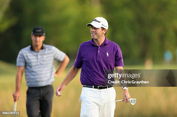 Ben Martin reacts after making his putt on the 18th during Round One of the Zurich Classic of New Orleans at TPC Louisiana on April 24, 2014 in...