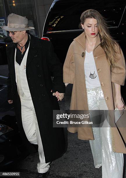 Johnny Depp and fiancee Amber Heard attend the opening night of "Cabaret" on Broadway at Studio 54 on April 24, 2014 in New York City.