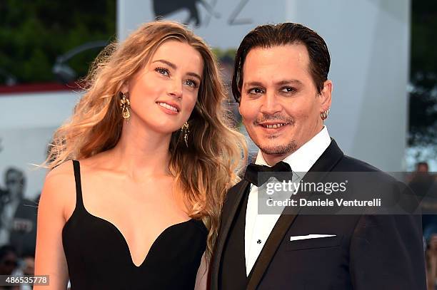 Johnny Depp and Amber Heard attend a premiere for 'Black Mass' during the 72nd Venice Film Festival on September 4, 2015 in Venice, Italy.