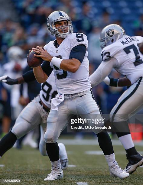 Quarterback Christian Ponder of the Oakland Raiders warms up prior to the game against the Seattle Seahawks at CenturyLink Field on September 3, 2015...