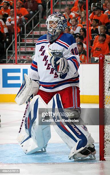 Henrik Lundqvist of the New York Rangers tends goal against the Philadelphia Flyers in Game Three of the First Round of the 2014 Stanley Cup Playoffs...