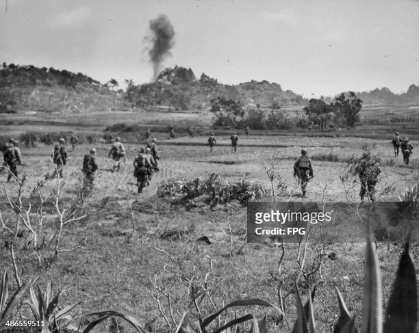 Marines advancing through Okinawa during the Pacific Campaign of World War Two, Japan, 1945.
