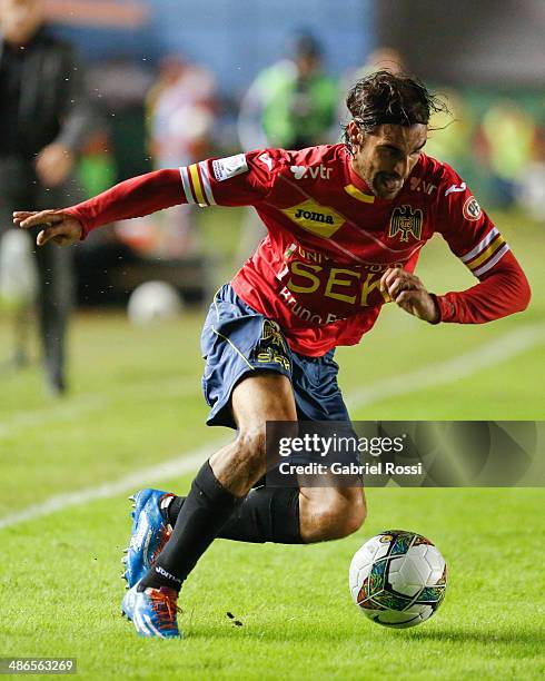 Sebastian Oscar Jaime of Union Española drives the ball during a match between Arsenal and Union Española as part of round sixteen of Copa...