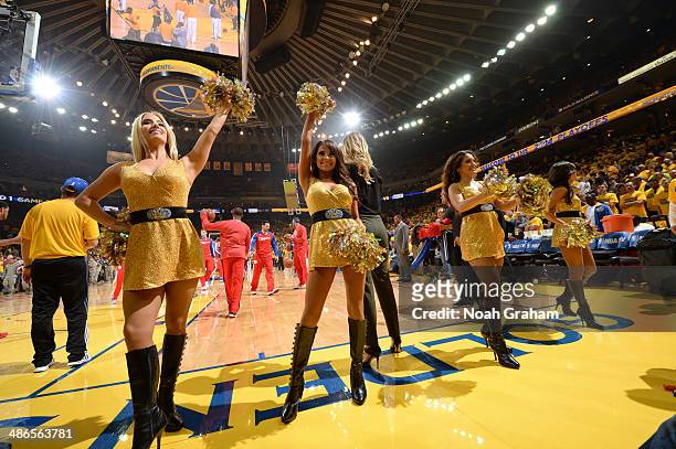 The Warrior Girls cheer on their team against the Los Angeles Clippers in Game Three of the Western Conference Quarterfinals at Oracle Arena on April...