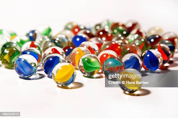 group of coloured marbles - hans barten stockfoto's en -beelden