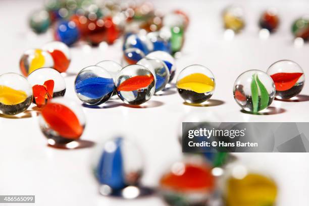 coloured marbles - hans barten stockfoto's en -beelden