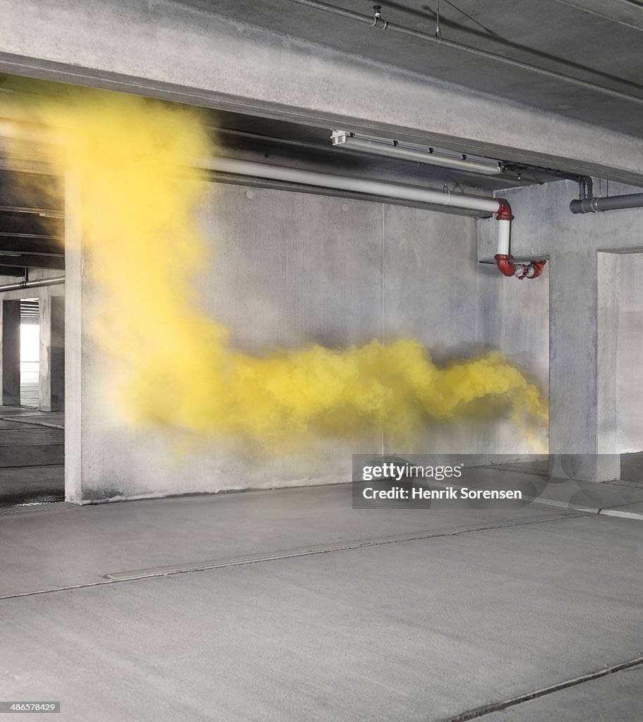 Colored smoke in an industrial environment