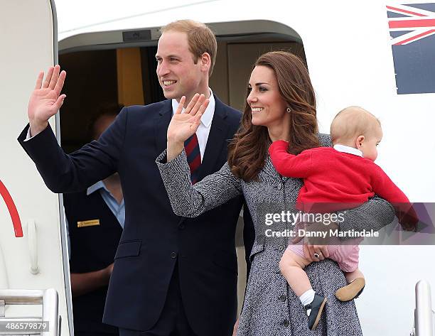 Prince George of Cambridge, Catherine, Duchess of Cambridge and Prince William, Duke of Cambridge depart Fairbairn Defence Base on April 25, 2014 in...