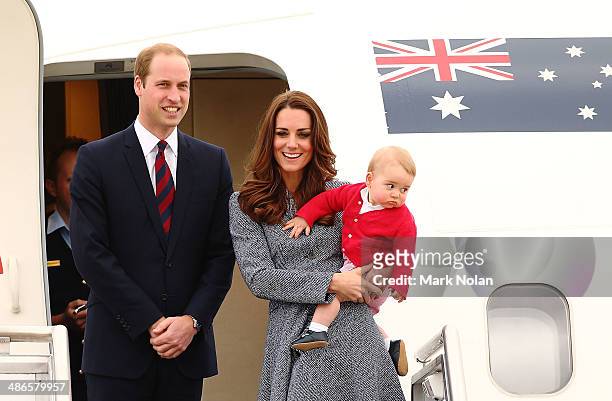 Catherine, Duchess of Cambridge, Prince William, Duke of Cambridge and Prince George of Cambridge leave Fairbairne Airbase as they head back to the...
