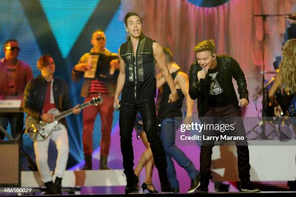 Prince Royce and Michael Telo perform onstage during the 2014 Billboard Latin Music Awards at Bank United Center on April 24, 2014 in Miami, Florida.