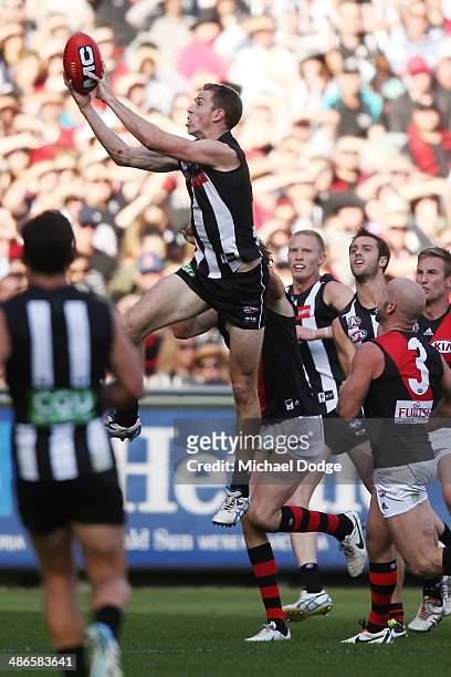 Nick Maxwell of the Magpies marks the ball during the round six AFL match between the Collingwood Magpies and the Essesdon Bombers at Melbourne...