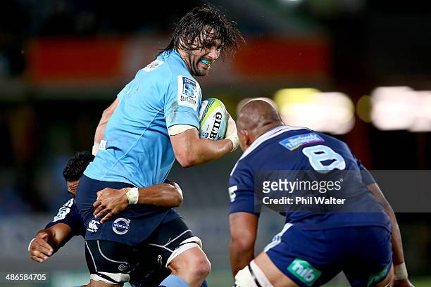 Jacques Potgieter of the Waratahs is tackled by Freancis Saili of the Blues during the round 11 Super Rugby match between the Blues and the Waratahs...