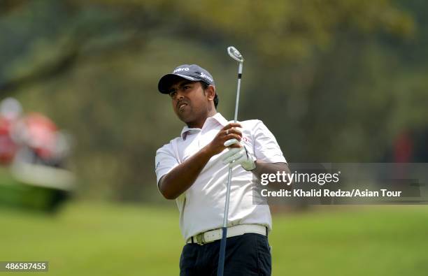 Anirban Lahiri of India plays a shot during round two of the CIMB Niaga Indonesian Masters at Royale Jakarta Golf Club on April 25, 2014 in Jakarta,...