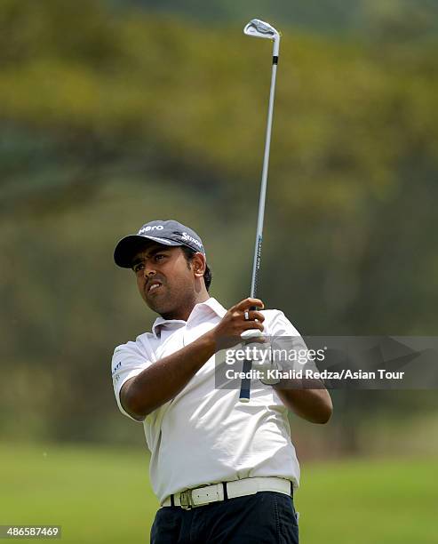 Anirban Lahiri of India plays a shot during round two of the CIMB Niaga Indonesian Masters at Royale Jakarta Golf Club on April 25, 2014 in Jakarta,...