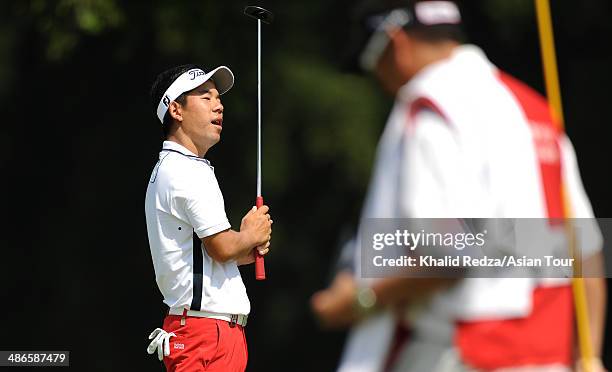 Arnond Vongvanij of Thailand looks on during round four of the CIMB Niaga Indonesian Masters at Royale Jakarta Golf Club on April 25, 2014 in...