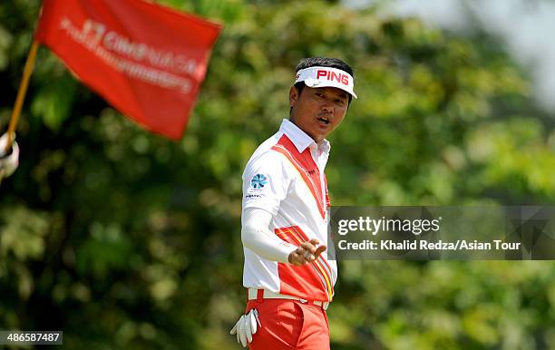 Lin Wen Tang of Chinese Taipei reacts during round two of the CIMB Niaga Indonesian Masters at Royale Jakarta Golf Club on April 25, 2014 in Jakarta,...