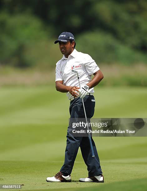 Anirban Lahiri of India plays a shot during round two of the CIMB Niaga Indonesian Masters at Royale Jakarta Golf Club on April 25, 2014 in Jakarta,...