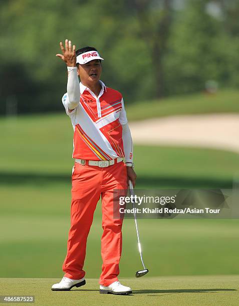 Lin Wen Tang of Chinese Taipei reacts during round two of the CIMB Niaga Indonesian Masters at Royale Jakarta Golf Club on April 25, 2014 in Jakarta,...