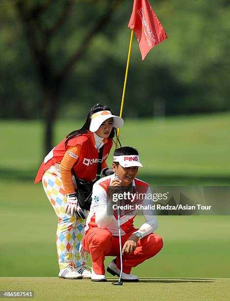 Lin Wen Tang of Chinese Taipei in action during round two of the CIMB Niaga Indonesian Masters at Royale Jakarta Golf Club on April 25, 2014 in...